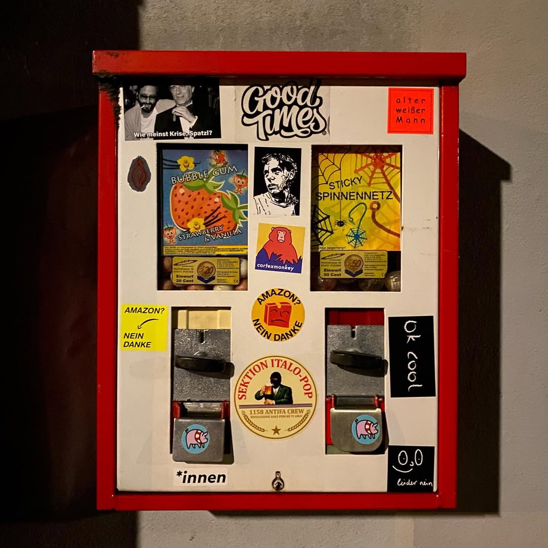 Bubble gum automat with several stickers